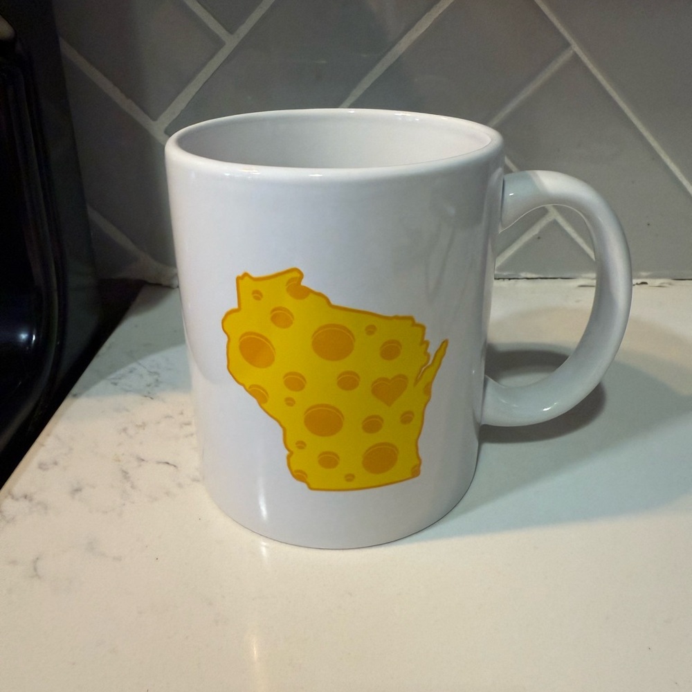 White Mug with Yellow Cheese Design